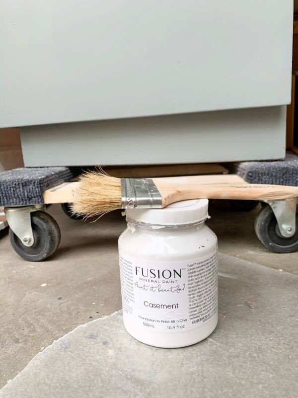Casement white for dry brushing a dresser, and a chip brush for the best application.