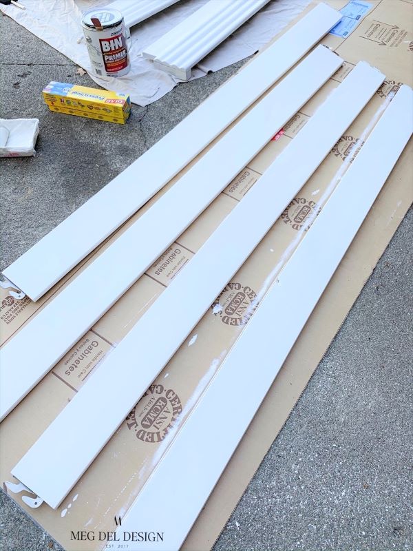 BIN primer being used over baseboards that will be painted white. Priming is a good step to prepare furniture for paint. 