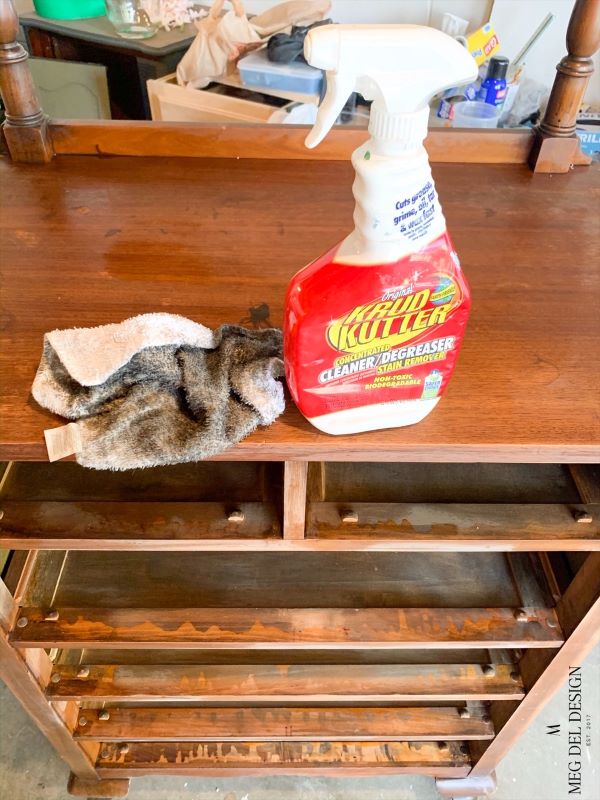 prepare furniture for paint with krud kutter cleaner and a rag to remove dirt