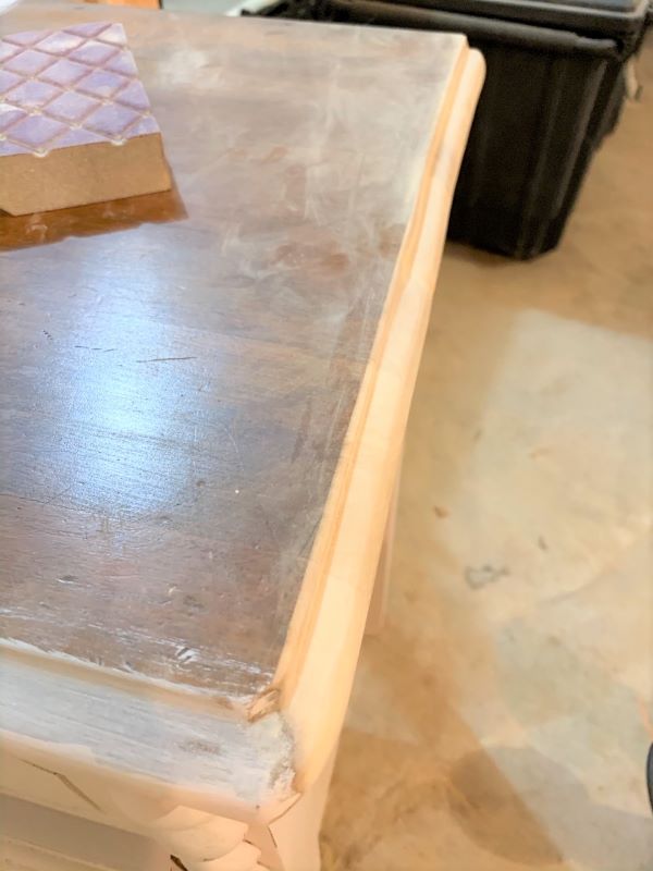 A first pass using a wood router to create a decorative edge to match the other sides of what will be painted pink end tables. Use a sanding block to even out