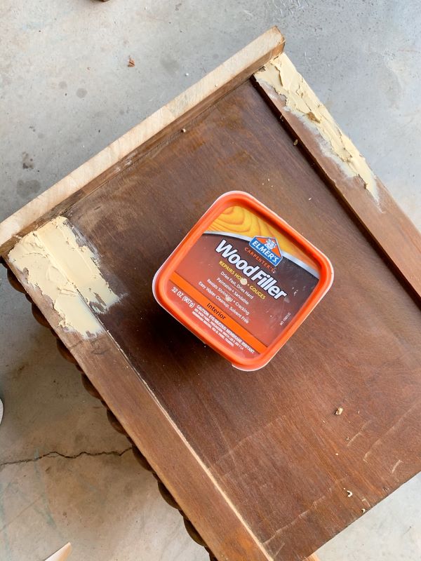 Use filler like bondo or wood filler to repair the damaged areas where the vanity used to be connected. Apply your filler generously.