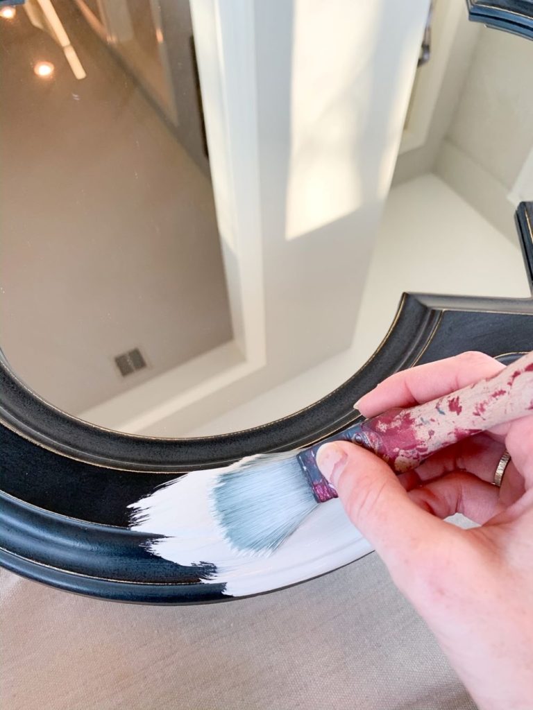 The bristles of the zibra square brush hold plenty of paint while allowing for precision while learning how to paint a mirror from navy to white
